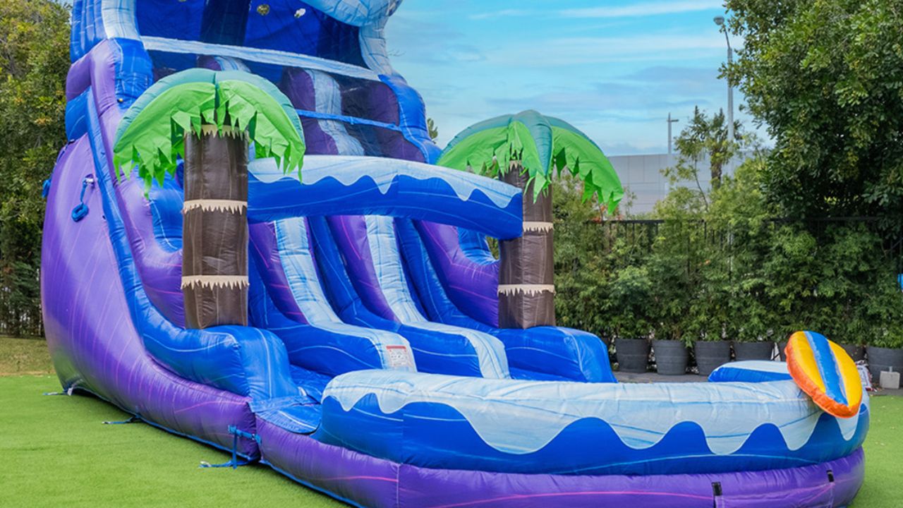 sliding down a thrilling commercial water slide
