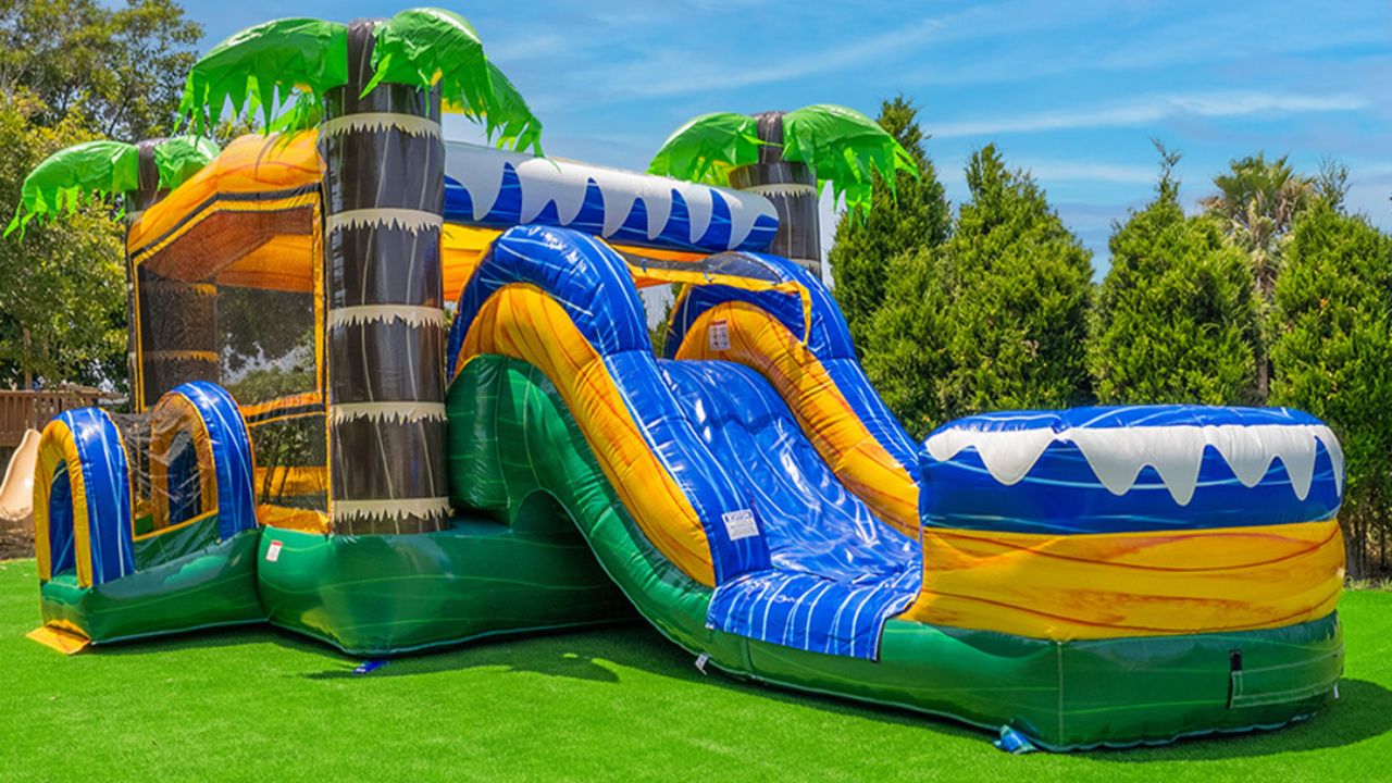 commercial bounce house with a slide